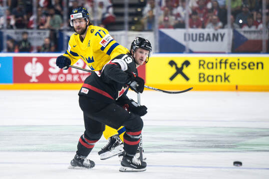 Victor Hedman of Sweden and Jared McCann of Canada