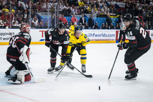 Olen Zelwegger of Canada, Fabian Zetterlund of Sweden and