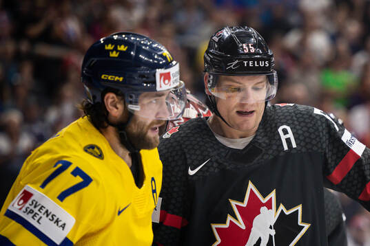 Victor Hedman of Sweden and Colton Parayko of Canada