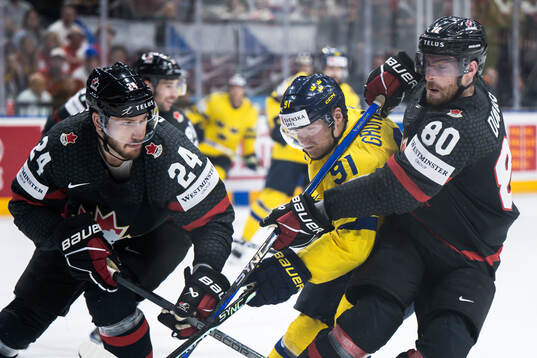 Jamie Oleksiak of Canada, Carl Grundström of Sweden and