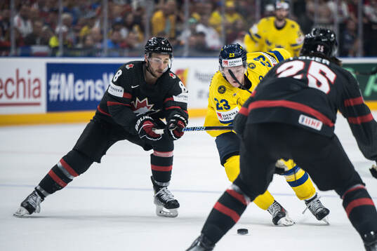 Michael Bunting of Canada and Lucas Raymond of Sweden