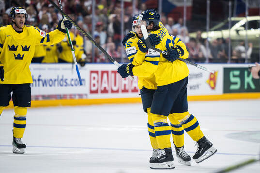 Erik Karlsson of Sweden celebrates