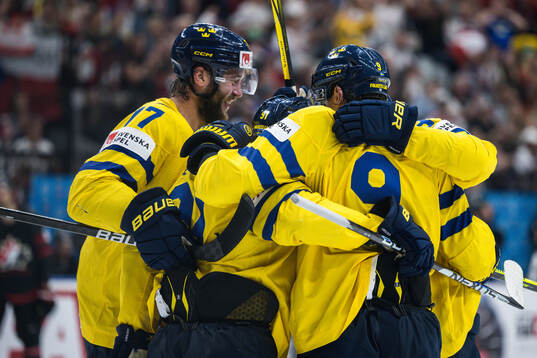 Victor Hedman and Carl Grundström of Sweden celebrates