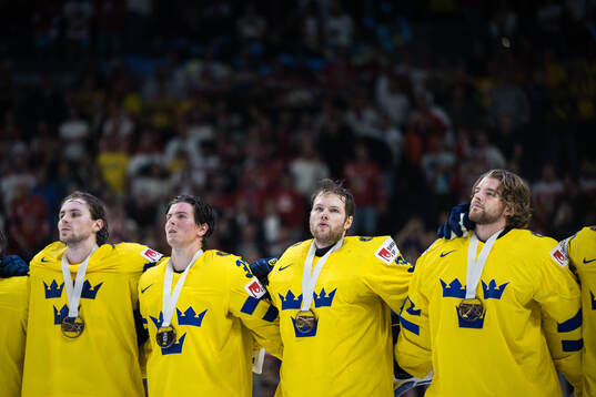 Goaltender Filip Gustavsson of Sweden with team mates