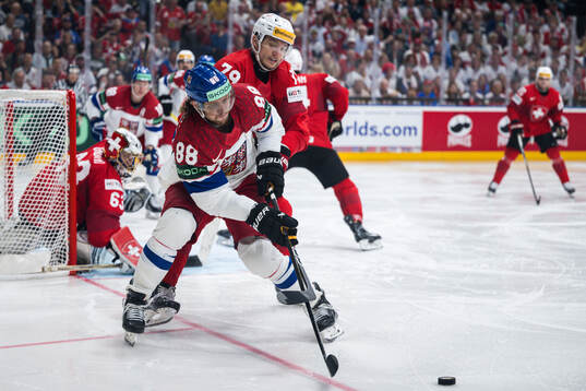 David Pastrnak of Czech Republic and Calvin Thurkauf of