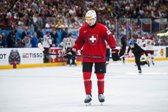 Dario Simion of Switzerland looks dejected