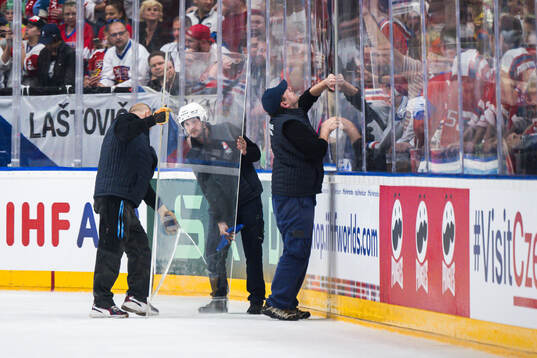 Sheet of plexi glass being replaced