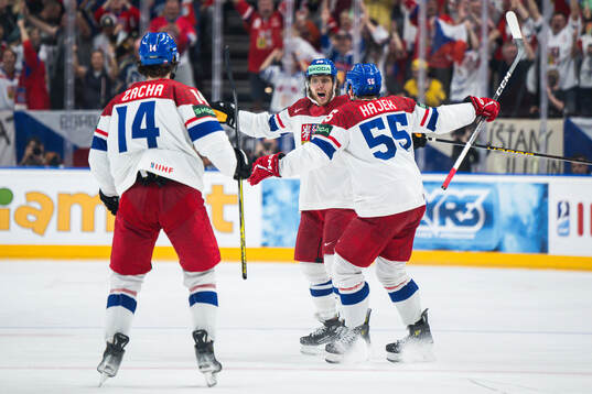 David Pastrnak of Czech Republic celebrates with team mates