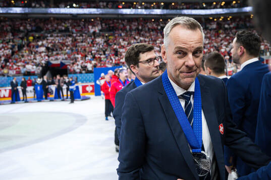 Assistant coach Tommy Albelin of Switzerland looks dejected