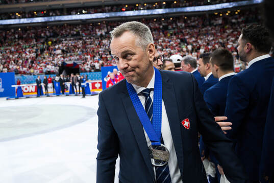 Assistant coach Tommy Albelin of Switzerland looks dejected
