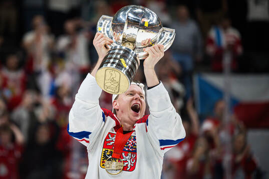 Roman Cervenka of Czech Republic celebrates with trophy