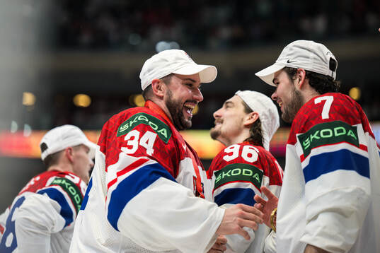 Petr Mrazek and David Spacek of Czech Republic celebrate