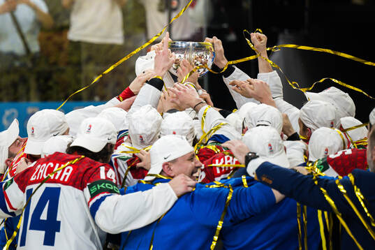 Players of Czech Republic lift the trophy