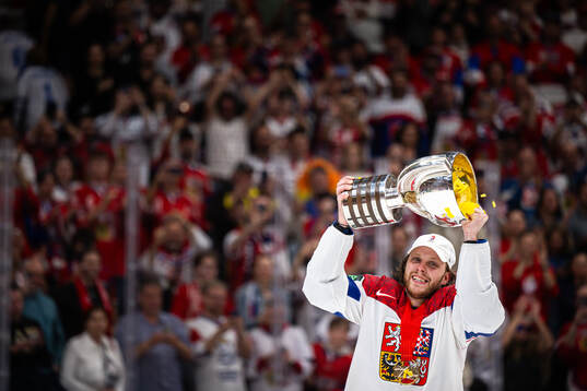 David Pastrnak of Czech Republic celebrates with the trophy