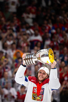 David Pastrnak of Czech Republic celebrates with the trophy