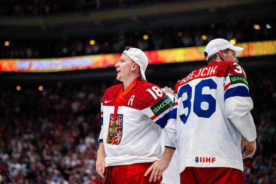 Ondrej Palat and Jakub Krejcik celebrate with their gold