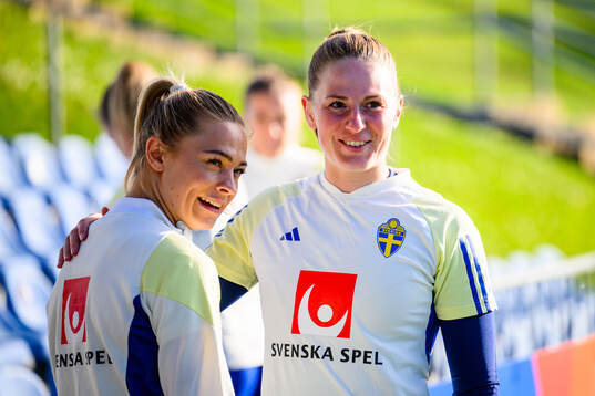 Fridolina Rolfö and Goalkeeper Tove Enblom of Sweden at a