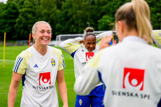 Magdalena Eriksson and Madelen Janogy of Sweden at a
