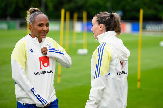 Madelen Janogy and Kosovare Asllani of Sweden at a training