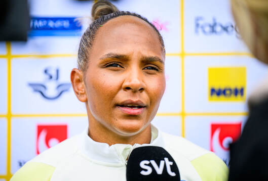 Madelen Janogy of Sweden is interviewed by the media