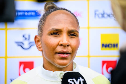 Madelen Janogy of Sweden is interviewed by the media
