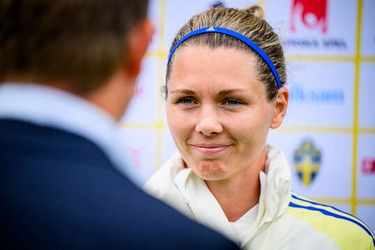 Goalkeeper Jennifer Falk of Sweden is interviewed by the