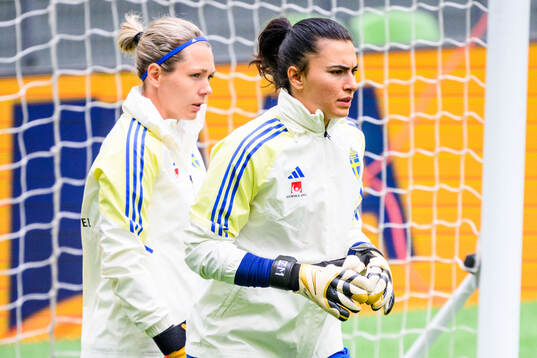 Goalkeeper Jennifer Falk and Goalkeeper Zecira Musovic of