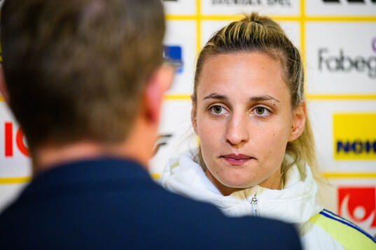 Nathalie Björn of Sweden is interviewed by the media at a