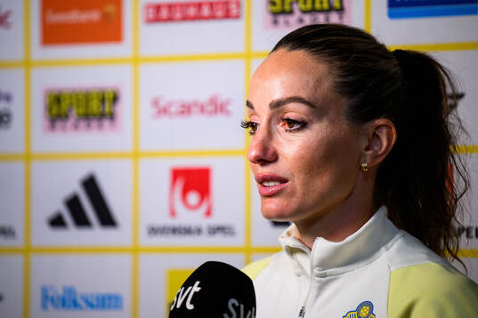 Kosovare Asllani of Sweden is interviewed by the media at a