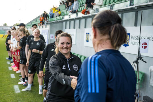 And Head coach Anja Heiner-Möller of Denmark