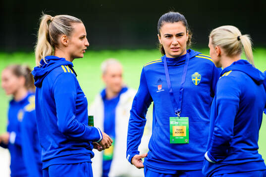 Nathalie Björn and Goalkeeper Zecira Musovic of Sweden