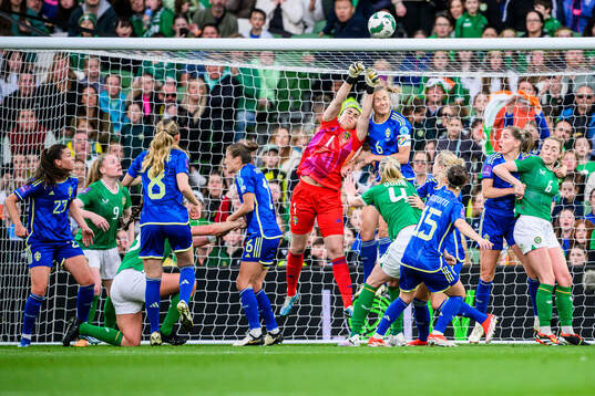 Goalkeeper Zecira Musovic and Magdalena Eriksson of Sweden