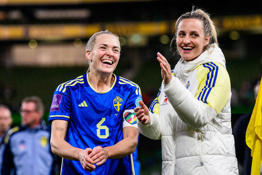Magdalena Eriksson and Nathalie Björn of Sweden celebrate