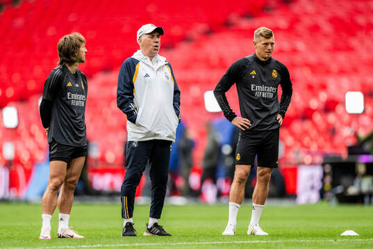 Luka Modric, Head coach Carlo Ancelotti and Toni Kroos of