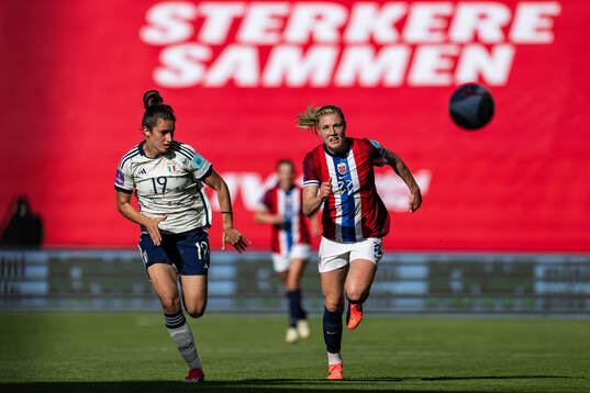 Martina Lenzini of Italy and Signe Gaupset of Norway