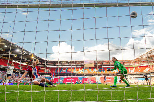 Mathilde Harviken of Norway clears the ball off the line
