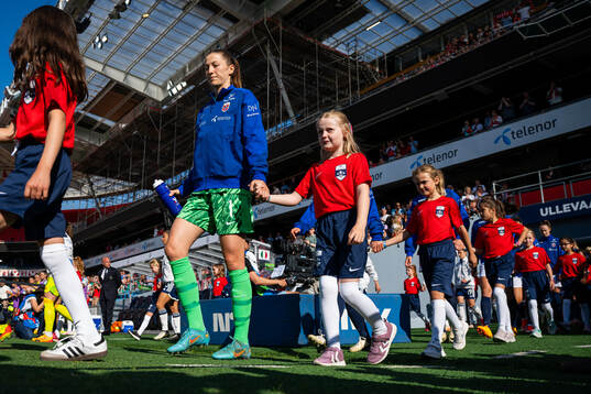 Goalkeeper Cecilie Fiskerstrand of Norway enters the pitch