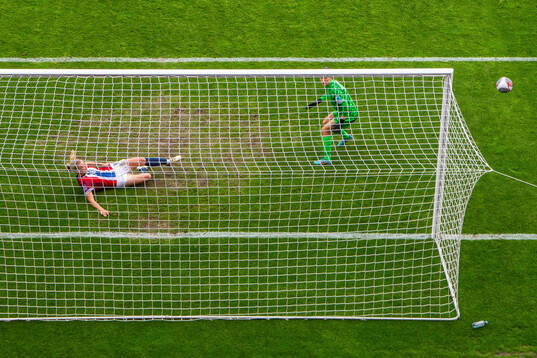 Mathilde Harviken of Norway clears the ball off the line