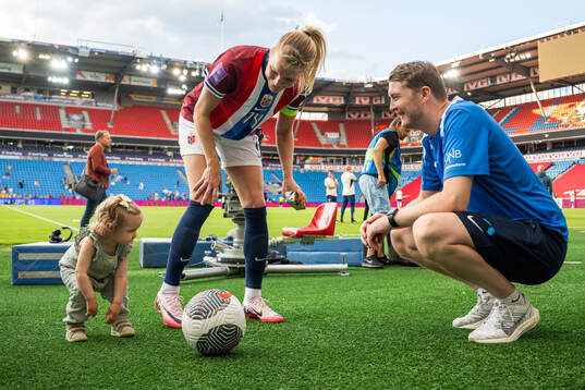 Ada Hegerberg and masseur Marius Eriksrud of Norway