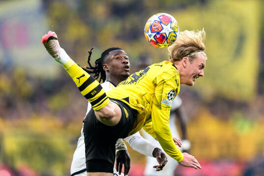 Eduardo Camavinga of Real Madrid and Julian Brandt of