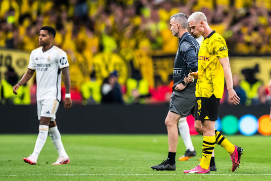 Julian Ryerson of Dortmund looks dejected
