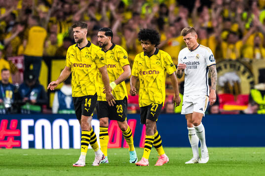 Toni Kroos of Real Madrid and Niclas Fullkrug, Emre Can,