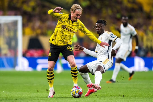 Eduardo Camavinga of Real Madrid and Julian Brandt of