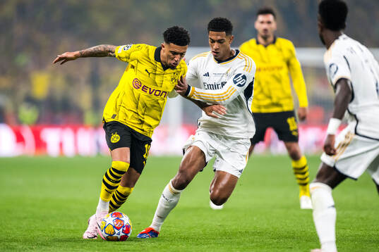 Jude Bellingham of Real Madrid and Jadon Sancho of Dortmund