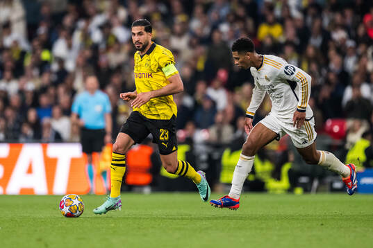 Emre Can of Dortmund and Jude Bellingham of Real Madrid