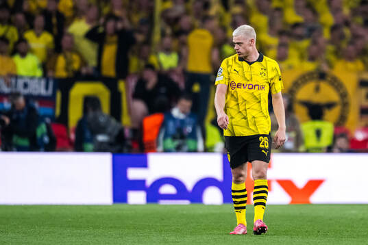 Julian Ryerson of Dortmund looks dejected