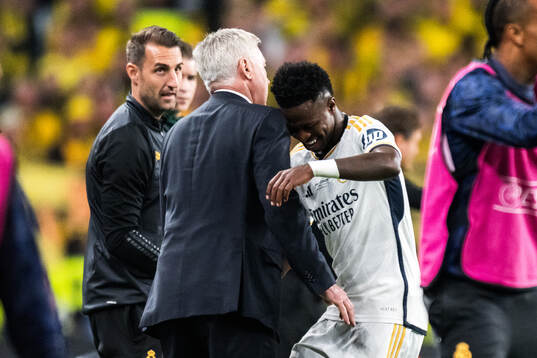 Vinicius Junior of Real Madrid celebrate with Head coach