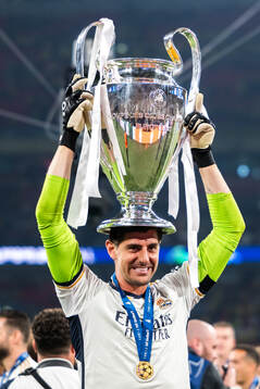 Thibaut Courtois of Real Madrid celebrates