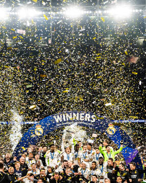 Luka Modric of Real Madrid lifts the trophy