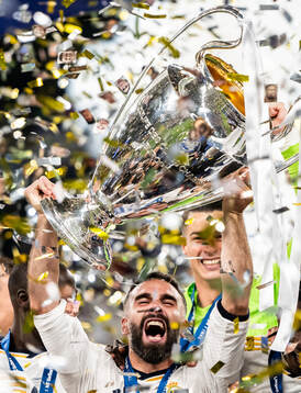 Dani Carvajal of Real Madrid lifts the trophy